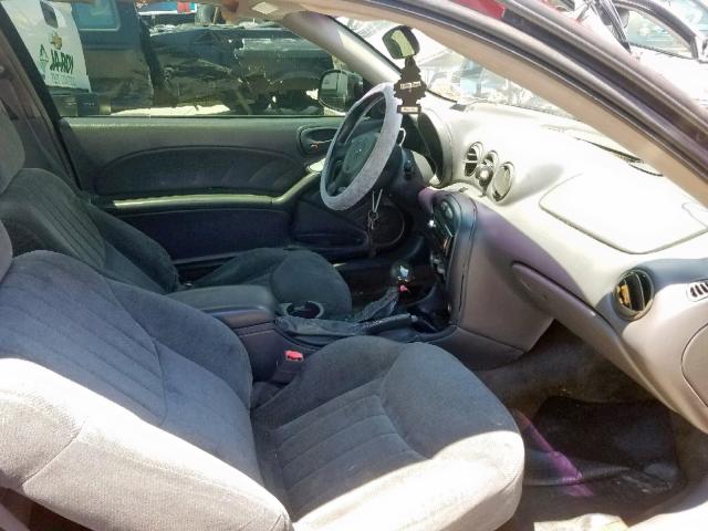 1G2NF12EXYM873525 - 2000 PONTIAC GRAND AM S RED photo 5