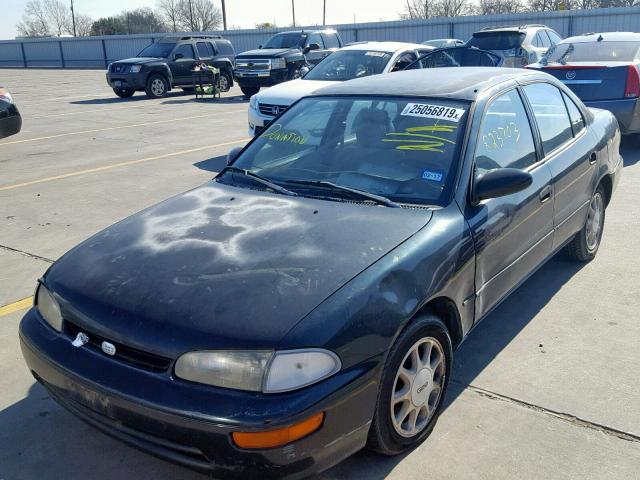 1Y1SK5264VZ461332 - 1997 GEO PRIZM GREEN photo 2