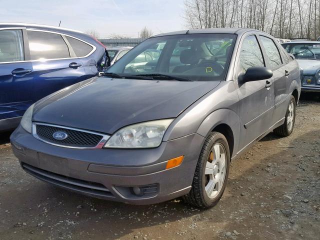 1FAHP34N77W219363 - 2007 FORD FOCUS ZX4 GRAY photo 2