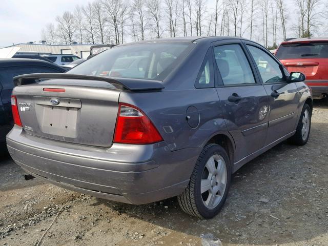 1FAHP34N77W219363 - 2007 FORD FOCUS ZX4 GRAY photo 4