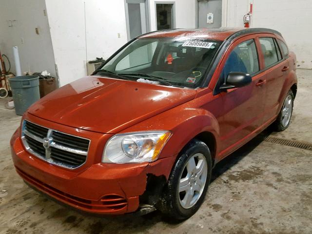 1B3HB48A69D184658 - 2009 DODGE CALIBER SX ORANGE photo 2