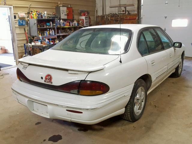 1G2HX52K8XH250970 - 1999 PONTIAC BONNEVILLE WHITE photo 4