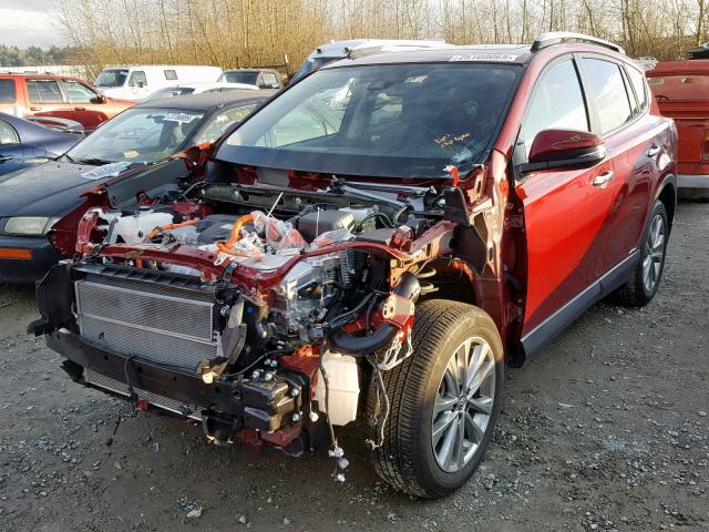 JTMDJREV9JD218049 - 2018 TOYOTA RAV4 HV LI RED photo 2