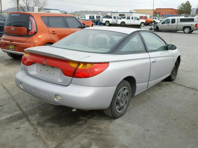 1G8ZR12721Z344062 - 2001 SATURN SC2 SILVER photo 4