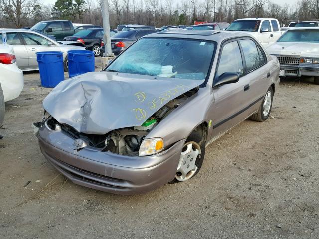 1Y1SK52802Z421424 - 2002 CHEVROLET GEO PRIZM BEIGE photo 2