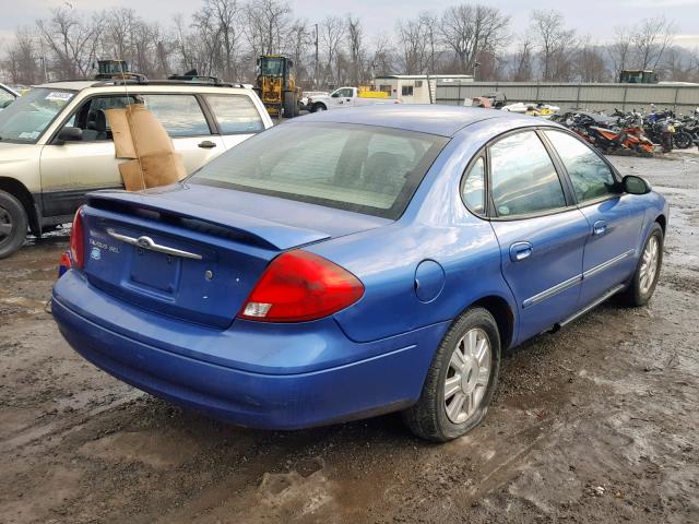 1FAHP56S23A129155 - 2003 FORD TAURUS SEL BLUE photo 4