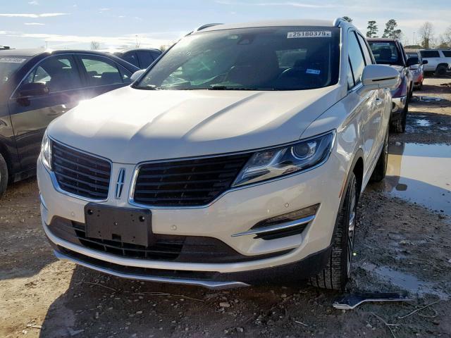 5LMCJ4C98GUJ30390 - 2016 LINCOLN MKC BLACK WHITE photo 2