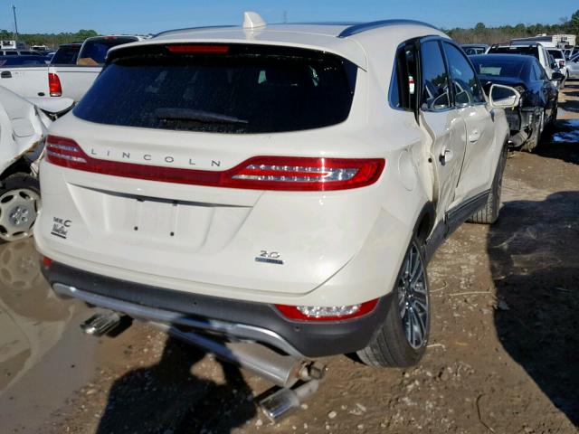 5LMCJ4C98GUJ30390 - 2016 LINCOLN MKC BLACK WHITE photo 4