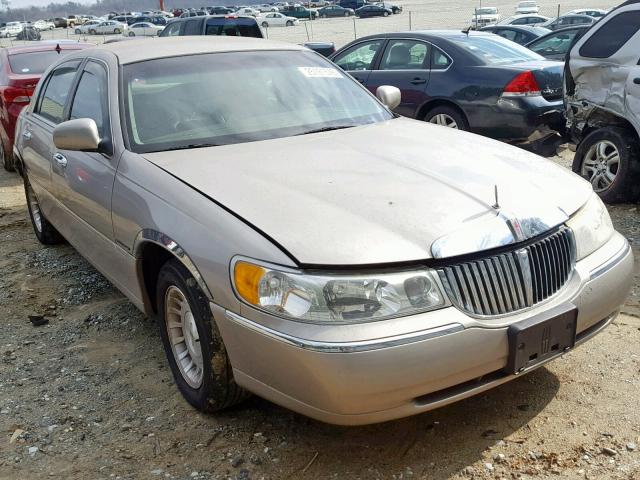 1LNHM81W0XY674505 - 1999 LINCOLN TOWN CAR E TAN photo 1