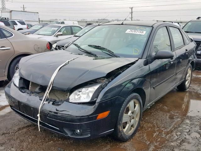 1FAFP34N35W156198 - 2005 FORD FOCUS ZX4 BLACK photo 2