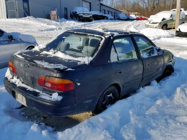 1Y1SK52861Z422883 - 2001 CHEVROLET GEO PRIZM BLACK photo 4