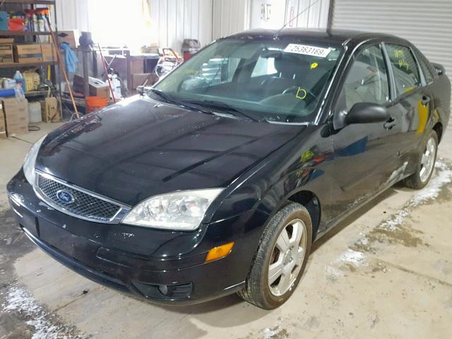 1FAHP34NX7W218904 - 2007 FORD FOCUS ZX4 BLACK photo 2