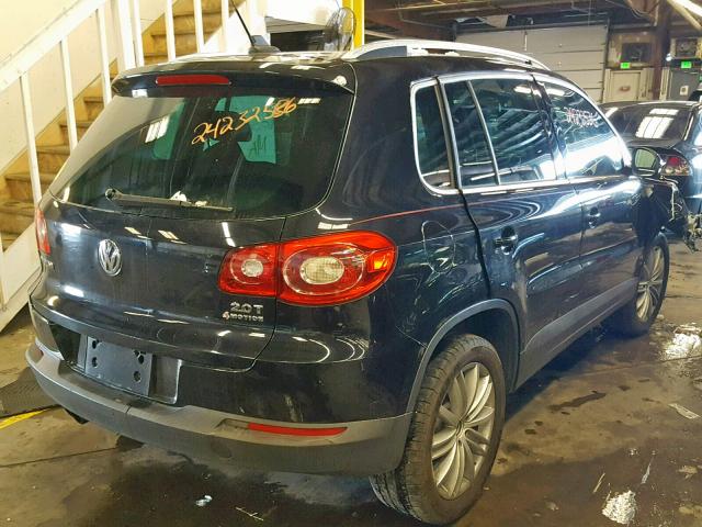 WVGBV7AXXAW528055 - 2010 VOLKSWAGEN TIGUAN SE BLACK photo 4