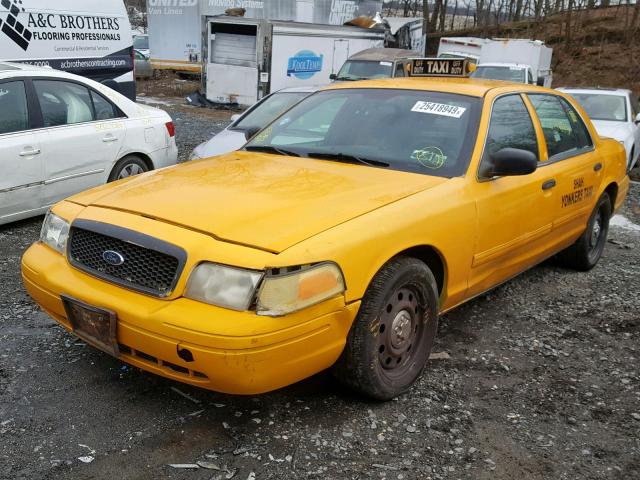 2FABP7AV1BX160521 - 2011 FORD CROWN VICT YELLOW photo 2