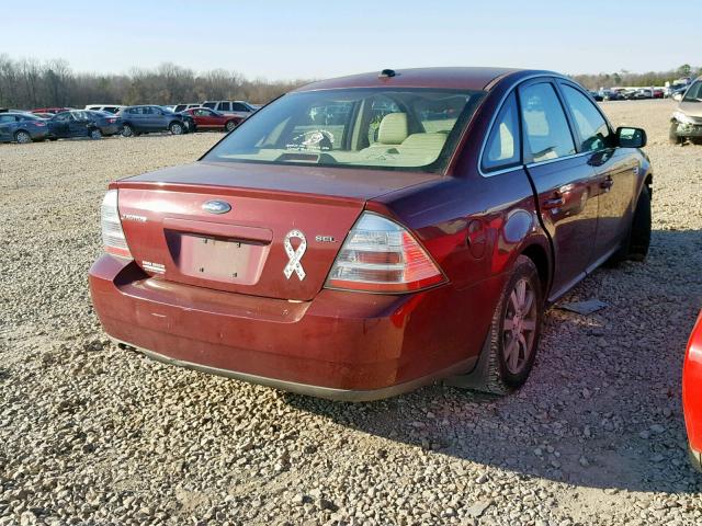 1FAHP24W48G147858 - 2008 FORD TAURUS SEL RED photo 4