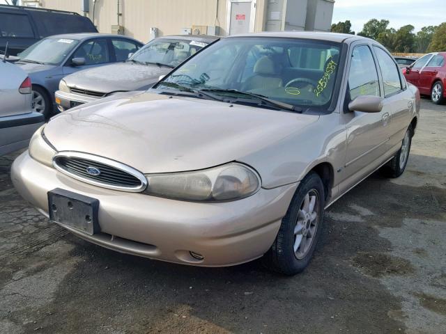 1FAFP6633XK152997 - 1999 FORD CONTOUR SE BEIGE photo 2