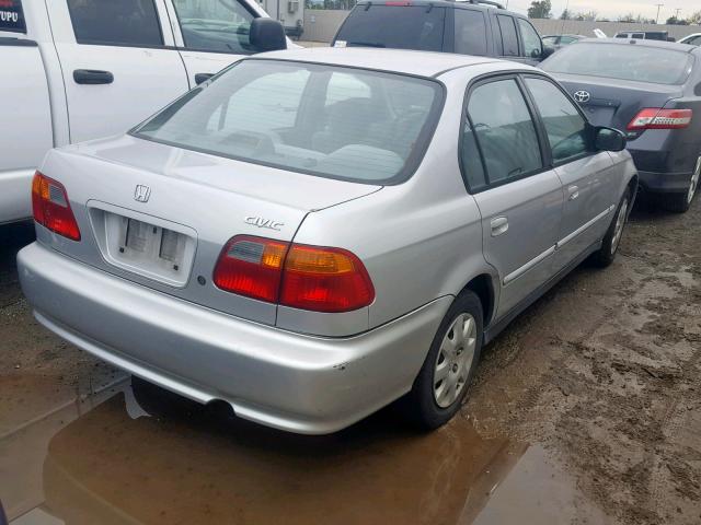 2HGEJ6617YH550083 - 2000 HONDA CIVIC BASE SILVER photo 4