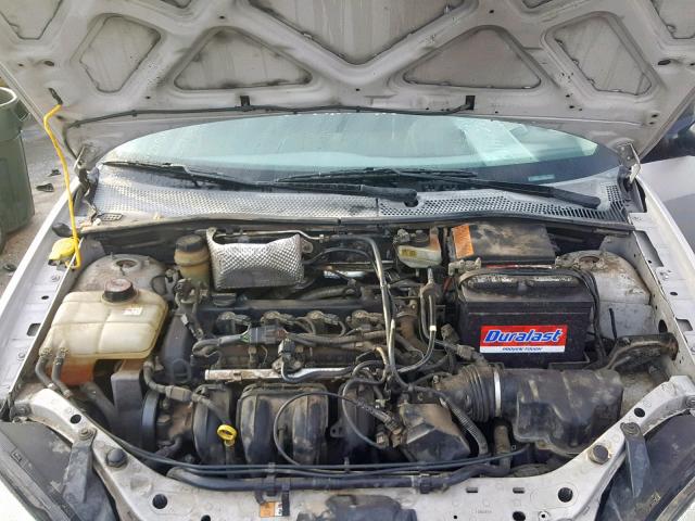 1FAFP34N05W101739 - 2005 FORD FOCUS ZX4 SILVER photo 7