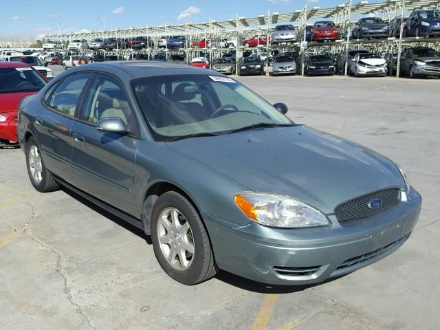 1FAFP56UX6A142183 - 2006 FORD TAURUS SEL SILVER photo 1