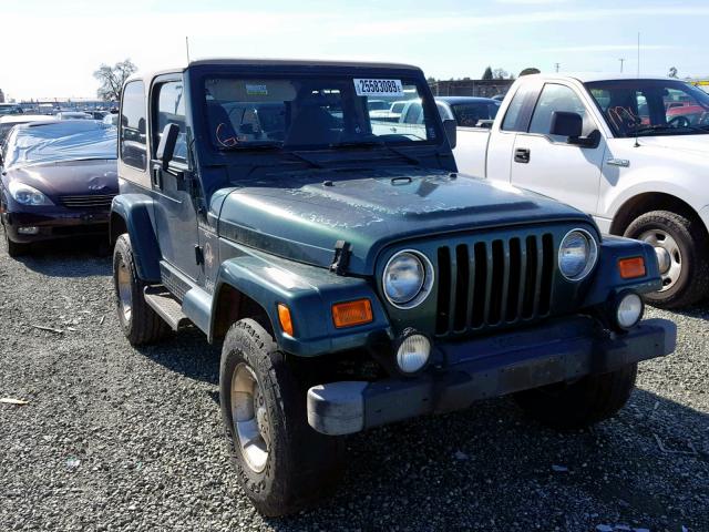 1J4FA59S4YP792823 - 2000 JEEP WRANGLER / GREEN photo 1