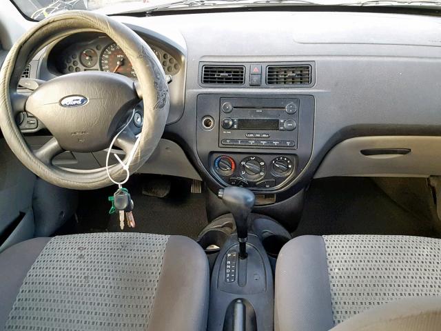 1FAFP34N06W155916 - 2006 FORD FOCUS ZX4 WHITE photo 9