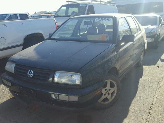 3VWPB81H4XM219544 - 1999 VOLKSWAGEN JETTA WOLF GREEN photo 2