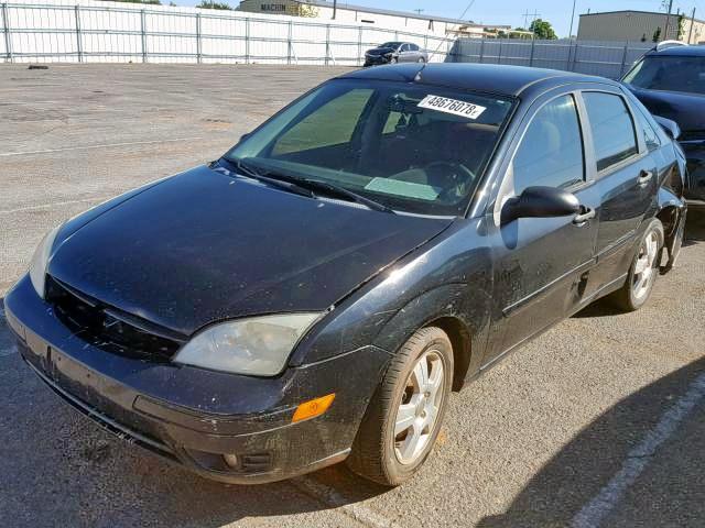 1FAFP34N76W105921 - 2006 FORD FOCUS ZX4 BLACK photo 2