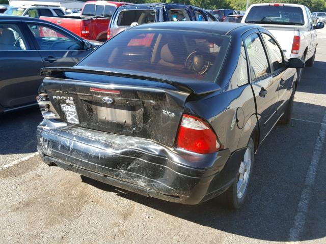 1FAFP34N76W105921 - 2006 FORD FOCUS ZX4 BLACK photo 4