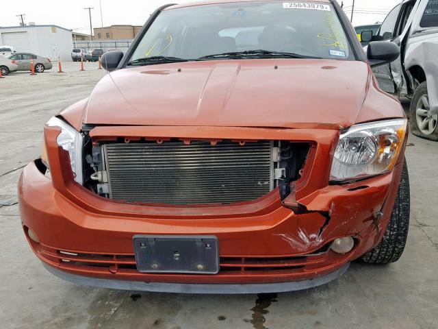 1B3HB48B28D566922 - 2008 DODGE CALIBER SX ORANGE photo 9