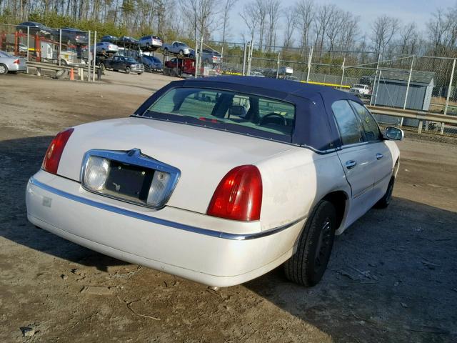 1LNHM83W7YY791917 - 2000 LINCOLN TOWN CAR C WHITE photo 4