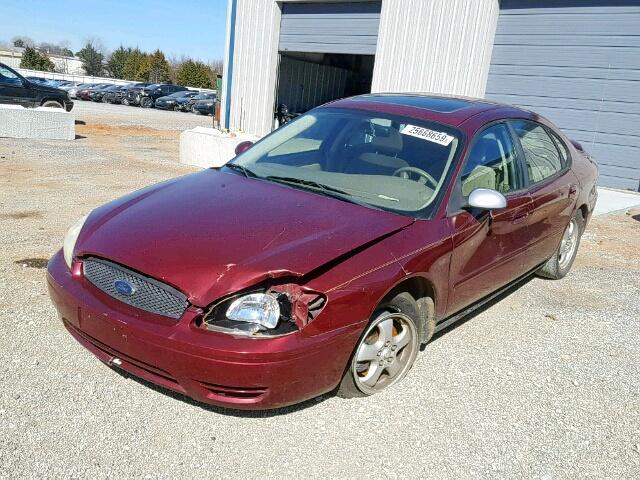 1FAFP55U34G121994 - 2004 FORD TAURUS SES RED photo 2