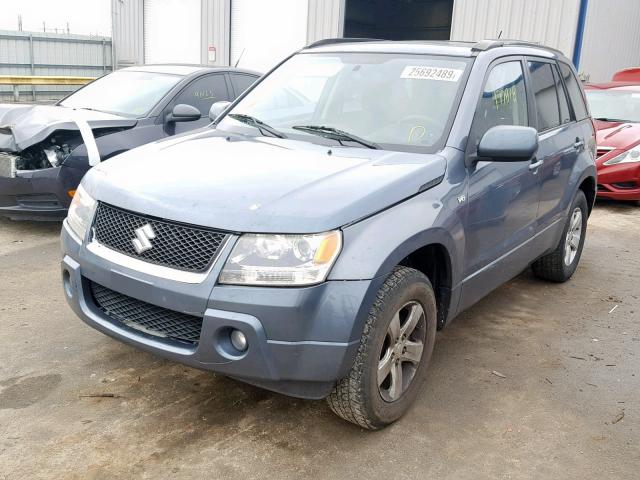 JS3TD944374203049 - 2007 SUZUKI GRAND VITA GRAY photo 2