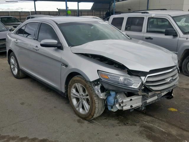 1FAHP2E89FG123973 - 2015 FORD TAURUS SEL SILVER photo 1