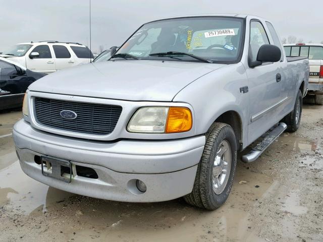 2FTRX17274CA91749 - 2004 FORD F-150 HERI SILVER photo 2