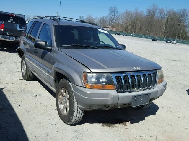 1J4G258S2XC677789 - 1999 JEEP GRAND CHER SILVER photo 1