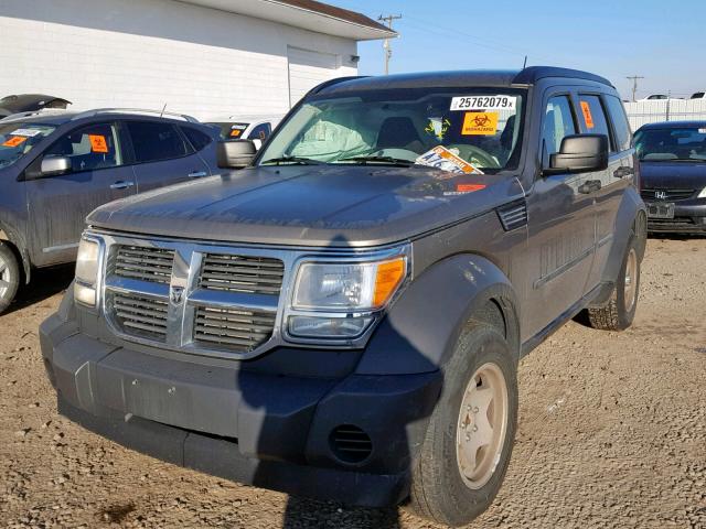 1D8GU28K07W616729 - 2007 DODGE NITRO SXT BEIGE photo 2