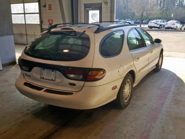 1FALP58S1VA166921 - 1997 FORD TAURUS LX WHITE photo 4