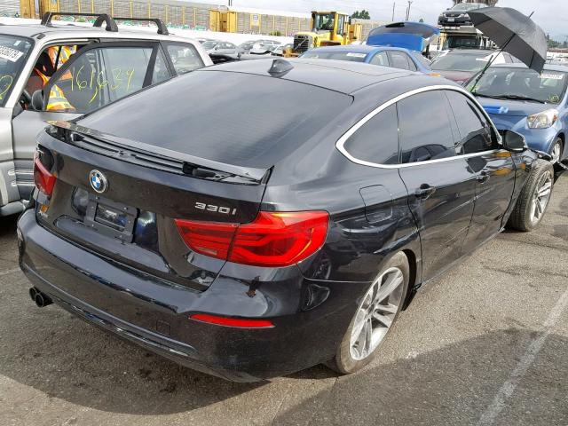 WBA8Z9C52JG828349 - 2018 BMW 330 XIGT BLACK photo 4