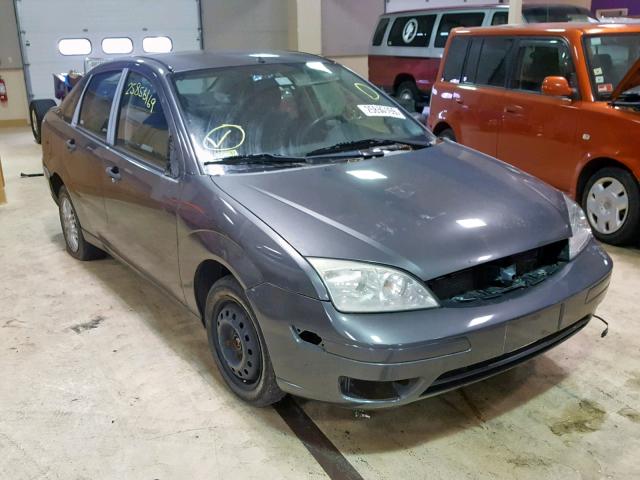 1FAHP34N87W255630 - 2007 FORD FOCUS ZX4 GRAY photo 1