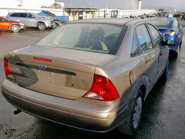 1FAFP34ZX4W154899 - 2004 FORD FOCUS SE C GOLD photo 4