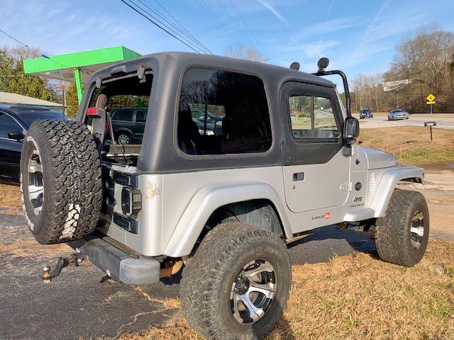 1J4FA39S55P375100 - 2005 JEEP WRANGLER X SILVER photo 4