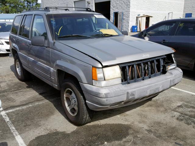 1J4FX58S6WC249705 - 1998 JEEP GRAND CHER GRAY photo 1