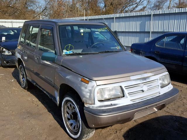 2S3TD03V6V6402131 - 1997 SUZUKI SIDEKICK J BEIGE photo 1