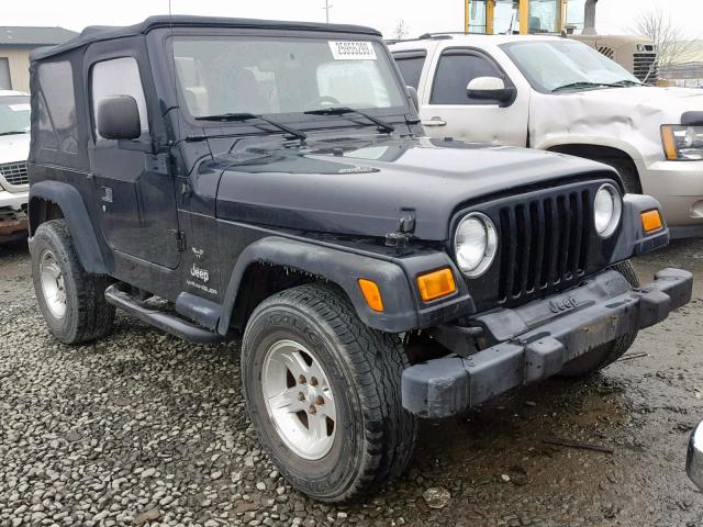 1J4FA29194P768744 - 2004 JEEP WRANGLER / BLACK photo 1