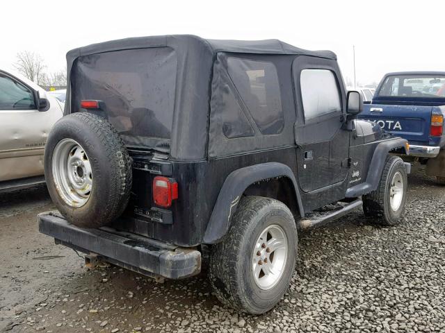 1J4FA29194P768744 - 2004 JEEP WRANGLER / BLACK photo 4