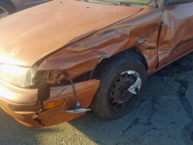 1Y1SK5268VZ413865 - 1997 GEO PRIZM BASE ORANGE photo 9