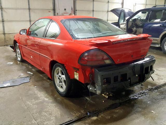 1G2NW12E12C107311 - 2002 PONTIAC GRAND AM G RED photo 3