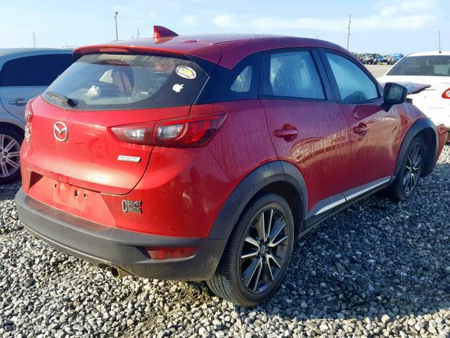 JM1DKFD77H0168008 - 2017 MAZDA CX-3 GRAND RED photo 4