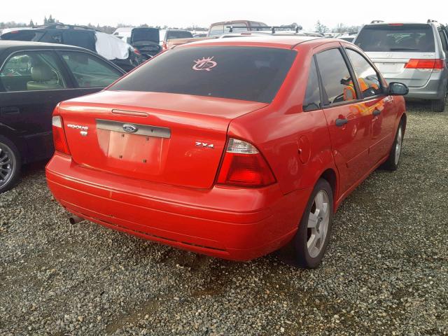 1FAFP34N26W208079 - 2006 FORD FOCUS ZX4 RED photo 4