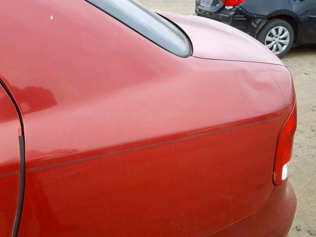 KL1TD52675B313209 - 2005 CHEVROLET AVEO BASE 勃艮第红 照片 10